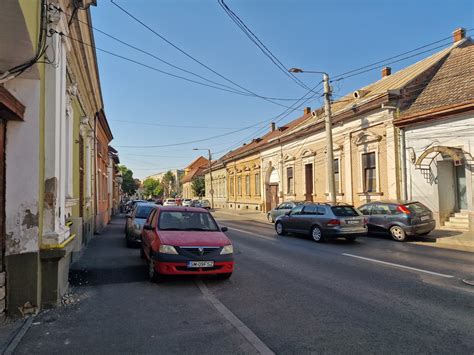 Régi szatmári szilváskerti kép aratókkal
