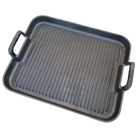 Öntöttvas grill lap a tűzhelyen