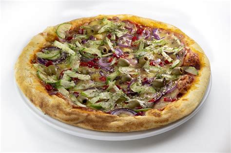 Változatos pizza feltétek