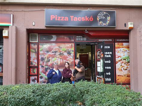 Pizza Tacskó logója