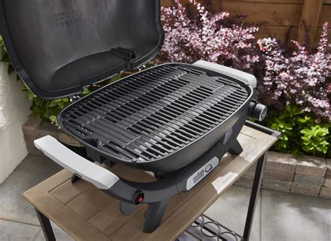 Weber grill fedővel