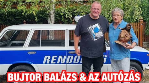 Bujtor Balázs a rendőrautóval