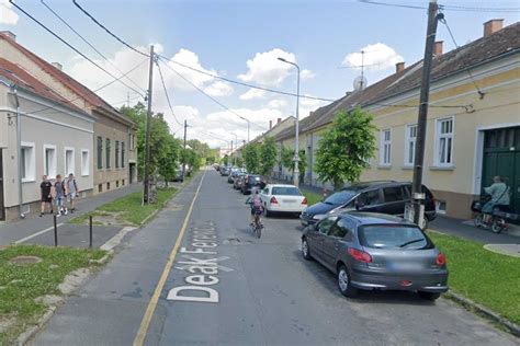 Makó Deák Ferenc utca látképe pizzéria kirakatával