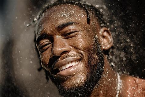 A man enjoying a refreshing shower with a multi-purpose product