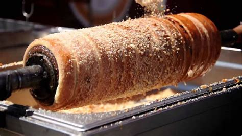 A kürtőskalács, mint hungarikum és siculicum logó, kiemelve a nemzeti és regionális jelentőségét.