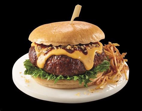 Big Daddy Burger logó és egy étterem külső képe