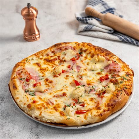 Fokhagymás tejfölös alapú pizza