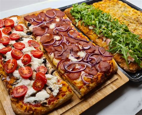 Pizza al taglio szeletek és a D'Al Michele logó