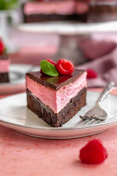 Raspberry mousse cake with fresh raspberries