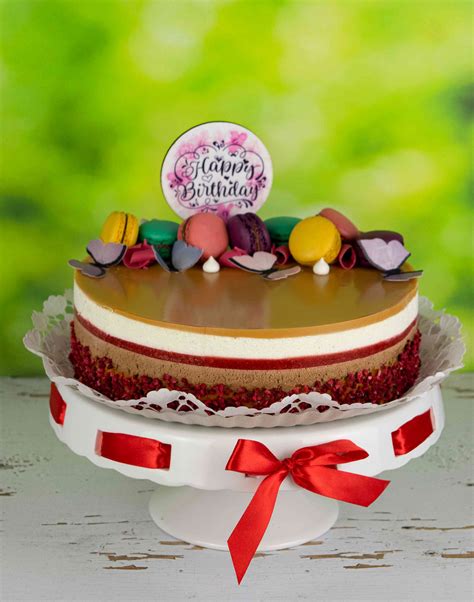 A Cini Minis torta vaníliával és almakockákkal díszítve