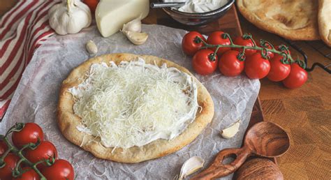 Történelmi utalás a lángos eredetére és fejlődésére