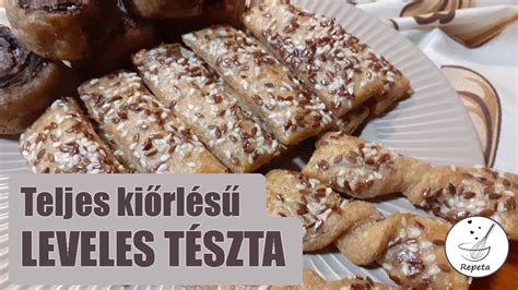 rendezett konyhai munkafelület, ahol éppen leveles tésztát formáznak