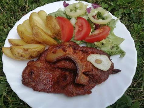 sertéskaraj grillezése szabad tűzön