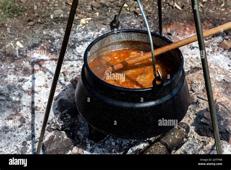 goulash cooking in a cauldron