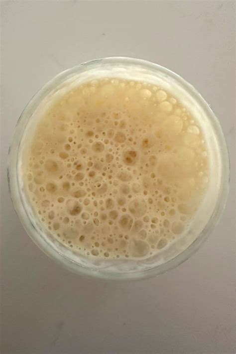 Sourdough starter showing active bubbles