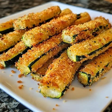 Crispy zucchini sticks with various dips