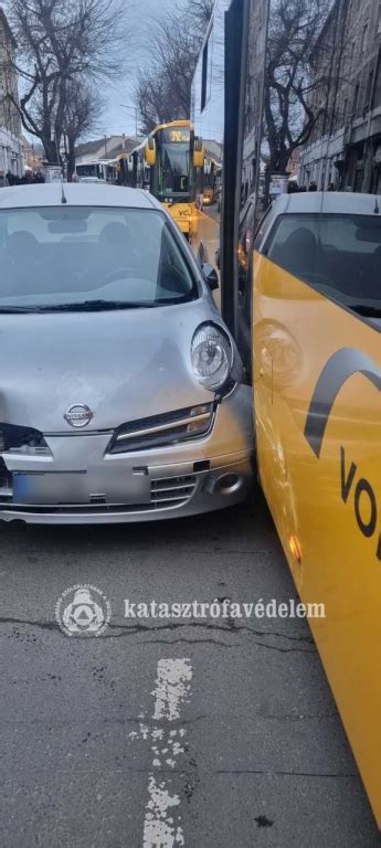 Csiga Ver Autósiskola logója és egy autó volánja