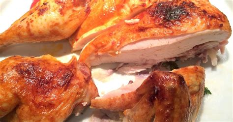 Kiterített csirke a grillrácson