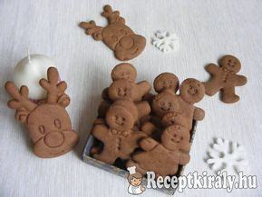 gyerekek díszítik a karácsonyi kakaós-mézes kekszeket