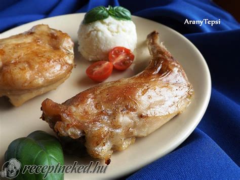 Fokhagymás sült nyúl tálalva zöldségekkel