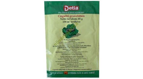 Csigaölő granulátum egy kerti ágyásban