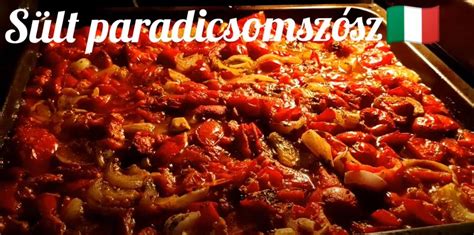 Egy tepsi frissen sült cukkinis paradicsomszósz a sütőből