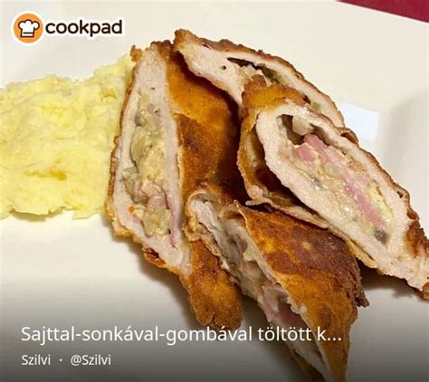 Töltött tortillák sütőtálban, sajttal megszórva