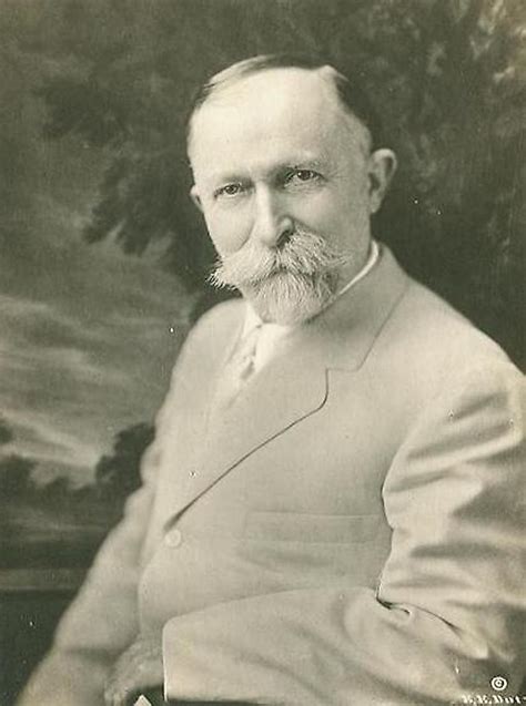 A historical photograph of Dr. John Harvey Kellogg, inventor of cornflakes and a pioneer in peanut butter development