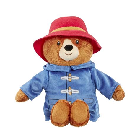 Paddington mackó portréja kék kabátban és jellegzetes kalapjában